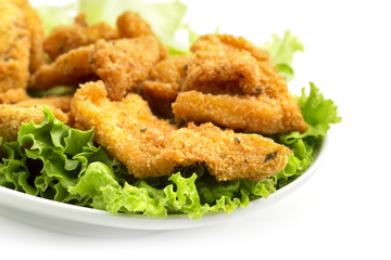 fried chicken on lettuce