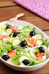 Greek salad with tomato, cucumber, onion, cheese and olives