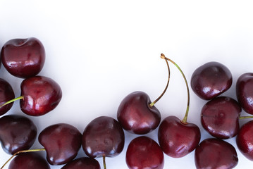 Cherries frame on white background