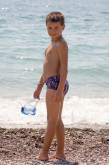 child having fun on the beach 7