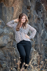 women posing on rocks