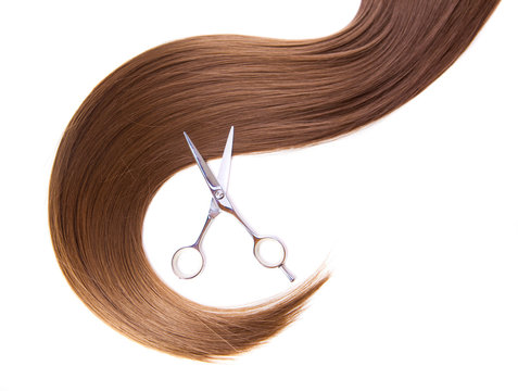 Hairdressers Scissors And Lock Of Hair