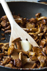 stir fried mushrooms (girolle) in a pan
