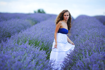 Woman standing on a lavender field