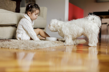 Little girl with a dog