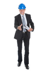 Male Architect Offering Handshake
