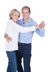 Portrait Of Mature Couple Dancing