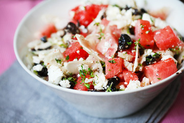 Summer salad with watermelons, greek feta cheese and olives - 54131644