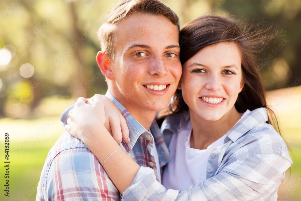 Wall mural young teenage couple outdoor