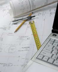 draft and a white laptop