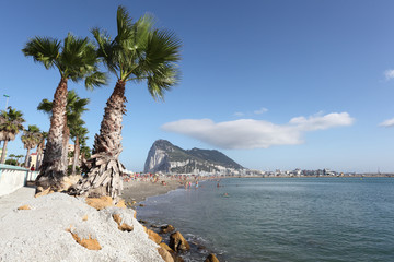 Poniente beach in La Linea, Spain. Gibraltar in background