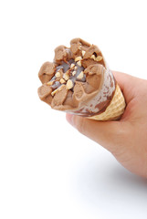 hand holding an ice cream cone with clipping path