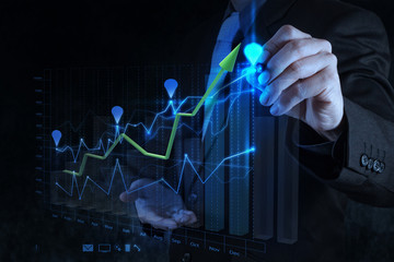 businessman hand working with new modern computer and business s