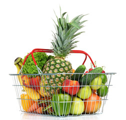 Assortment of fresh fruits and vegetables in metal basket,