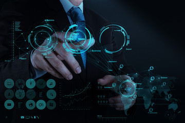 businessman hand working with new modern computer and business s