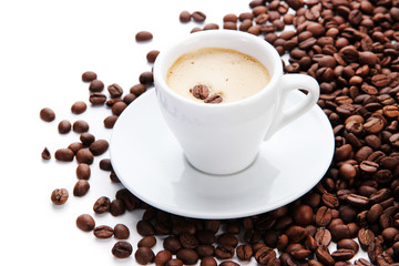 Cup of coffee with coffee beans, isolated on white