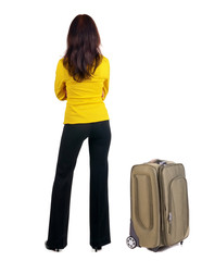 Back view of business woman  with  suitcase
