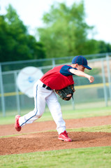 Young boy baseball pitcher