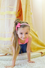 Smiling little girl look out from baldachin © Pavel Losevsky