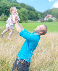 Happy young family (Daniel Gröblacher)