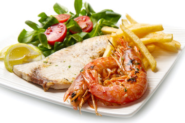 swordfish and grilled prawns with potatoes