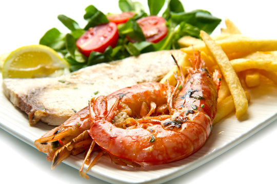 swordfish and grilled prawns with potatoes