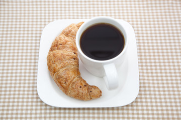 Croissant and a cup of coffee