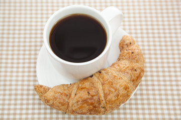 Croissant and a cup of coffee