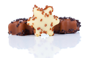 star shaped christmas cookies, with chocolate glaze