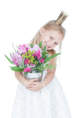 Little girl with colorful flowers over white