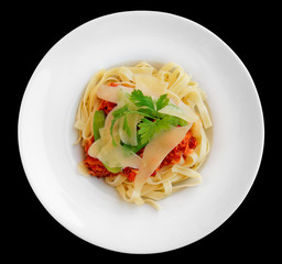Pasta with rabbit meat and tomato sauce, isolated