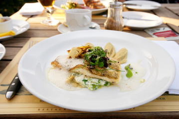 Walleye fillet with artichokes and molecular broth