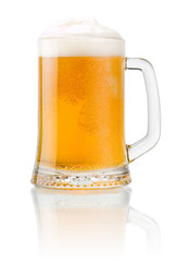 Mug fresh beer with cap of foam isolated on white background