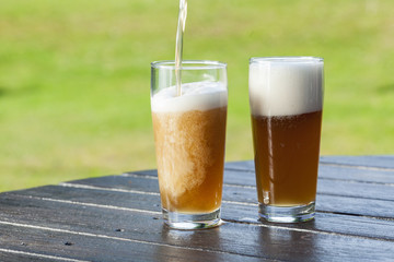 refreshing chilled german beer in summer garden