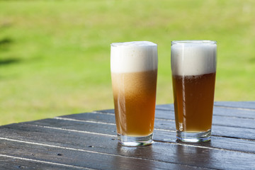 refreshing chilled german beer in summer garden