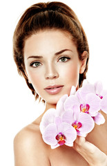 beautiful woman with pink orchid