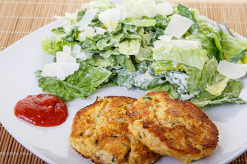 Dinner of Crab Cakes with Caesar Salad