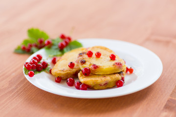 Pancakes with red currants