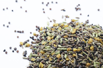 Mixture of Indian spices (Panch Phoron) on white background