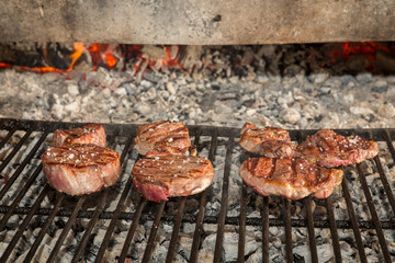 Sirloin steaks on grill