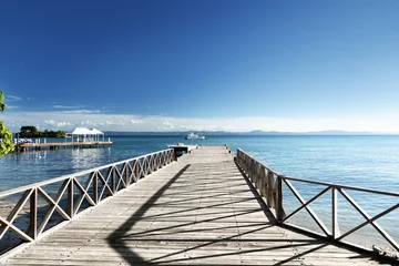 Acrylic prints Pier wooden pier in caribbean sea