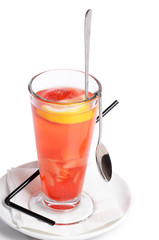 Cold fruit tea with an orange