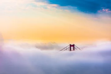 Photo sur Aluminium San Francisco World Famous Golden Gate Bridge in thich Fog after Sunrise