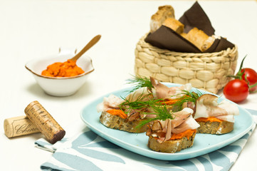 Canape with smocked ham and tomato pate