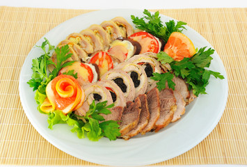 Dish with different meatloaf, sliced​​.