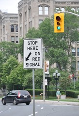 Stop here on the red signal signpost