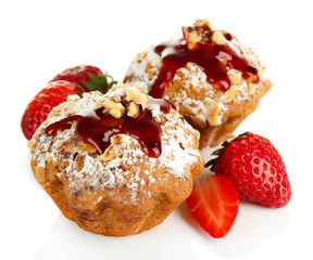 Tasty muffin cakes with strawberries, isolated on white