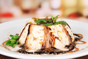 Panna Cotta with caramel and chocolate sauces,