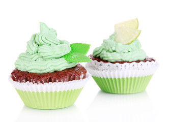 Delicious beautiful cupcakes isolated on white