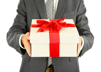 Young businessman present gift box, isolated on white